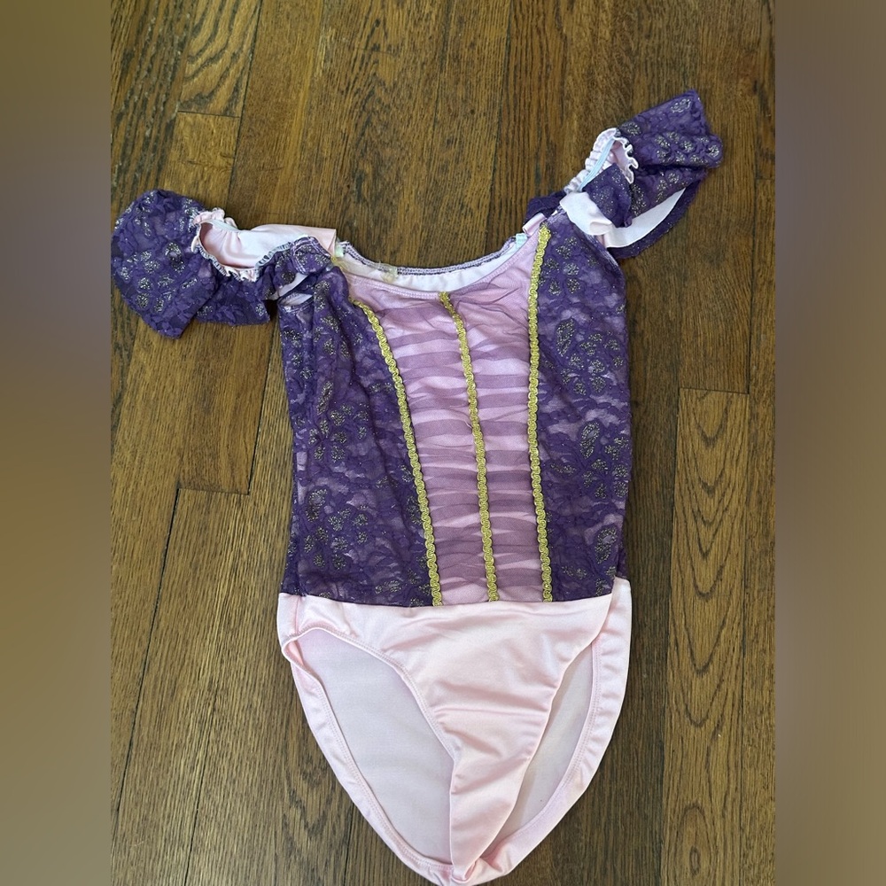 Purple and gold two piece ballet costume with hair ribbon. Skirt is detachable.